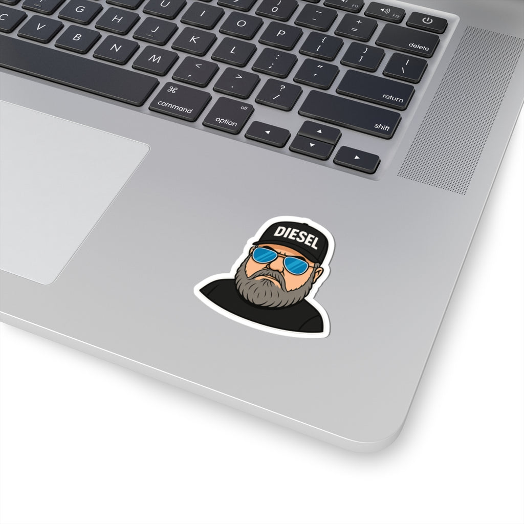 Built for the bold and made for the road, this premium DIESEL kiss-cut sticker features a rugged bearded outlaw character rocking the signature DIESEL cap and blue shades. Perfect for truckers, bikers, country rebels, hardworking dads, and anyone living t