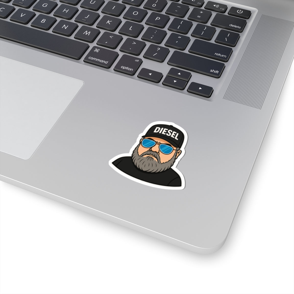 Built for the bold and made for the road, this premium DIESEL kiss-cut sticker features a rugged bearded outlaw character rocking the signature DIESEL cap and blue shades. Perfect for truckers, bikers, country rebels, hardworking dads, and anyone living t