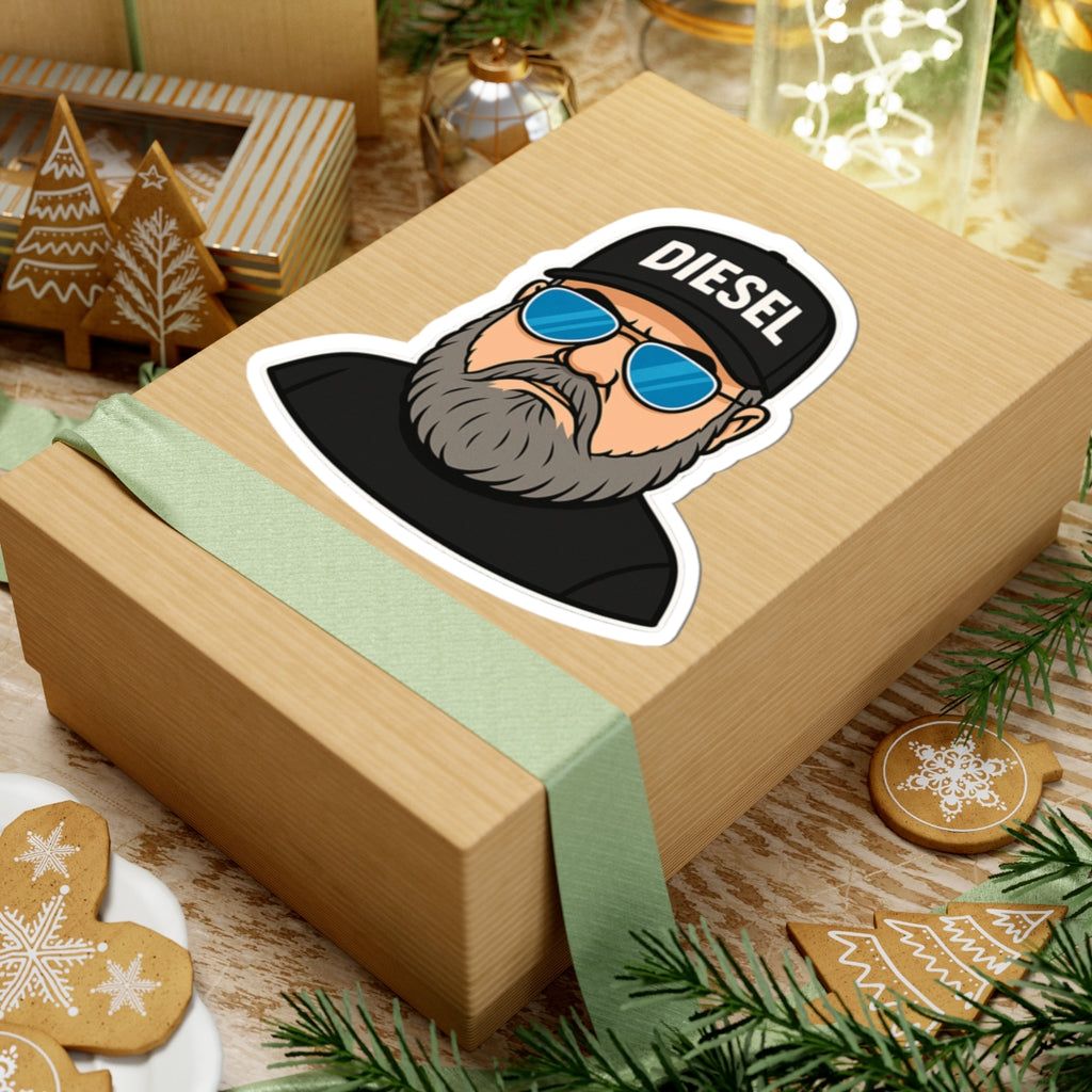 Built for the bold and made for the road, this premium DIESEL kiss-cut sticker features a rugged bearded outlaw character rocking the signature DIESEL cap and blue shades. Perfect for truckers, bikers, country rebels, hardworking dads, and anyone living t